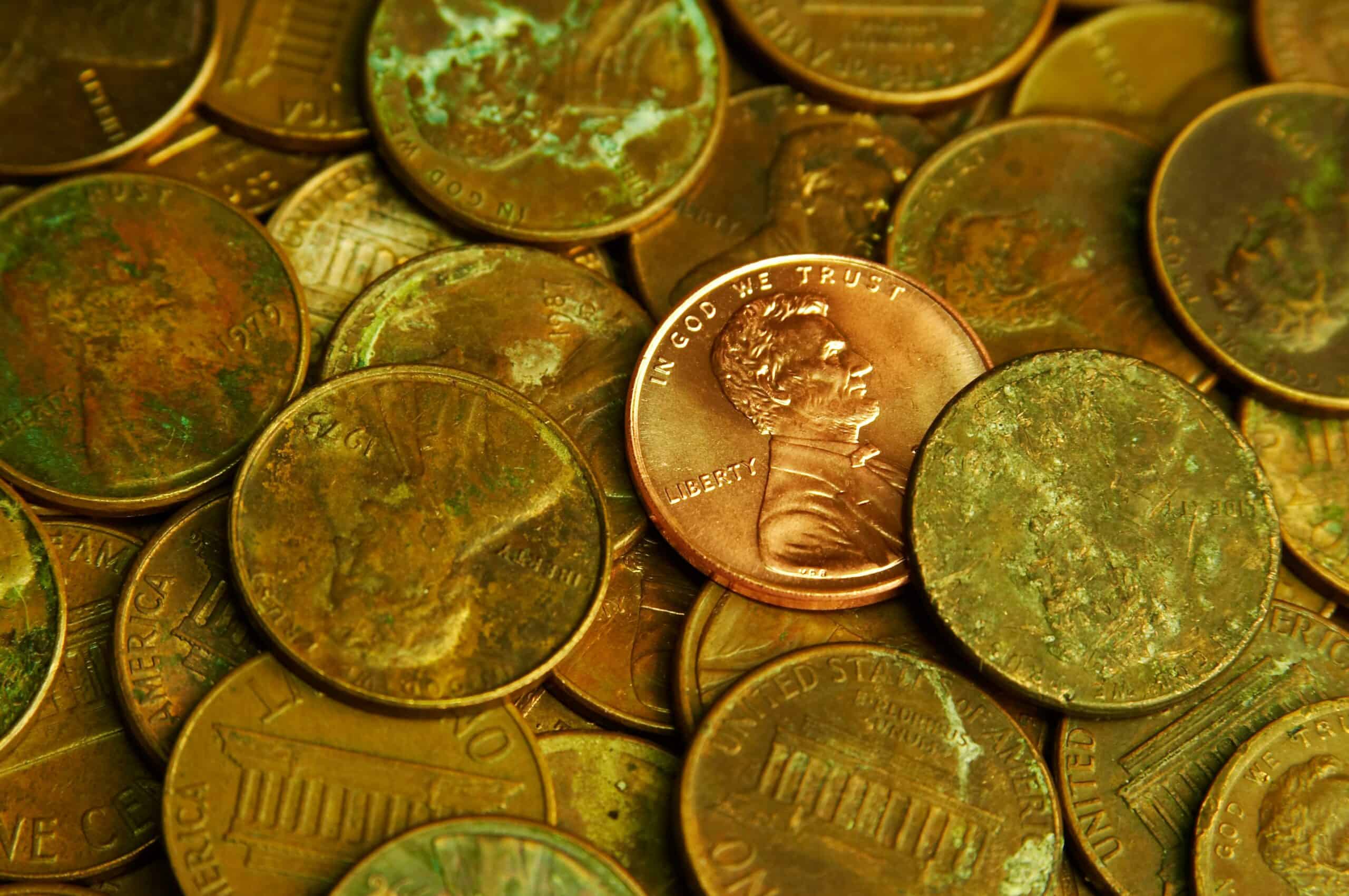 Dozens of pennies on a table